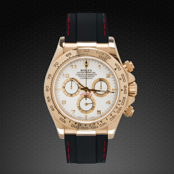 photo of yellow gold rolex daytona with rubber b couture series luxury watch band